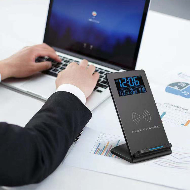 "Digital alarm clock with wireless charger LED display temperature calendar"
"Bedside alarm clock charging phone wirelessly with LED time display"
"LED alarm clock showing temperature and date on nightstand"
"Wireless charging alarm clock with adjustable brightness display"
"Multifunctional digital clock with wireless phone charging pad"