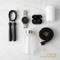 Fitness flat lay with smartwatch and earbuds