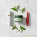 Glow & Hydrate Bundle flat lay on marble
